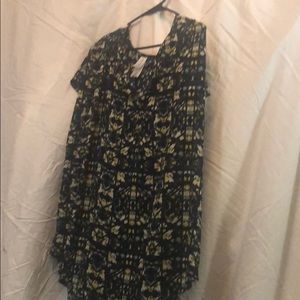 Multi-colored “Pure Energy” blouse never worn.